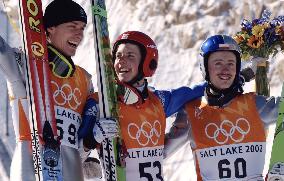 Switzerland's Ammann grabs gold medal in ski jumping